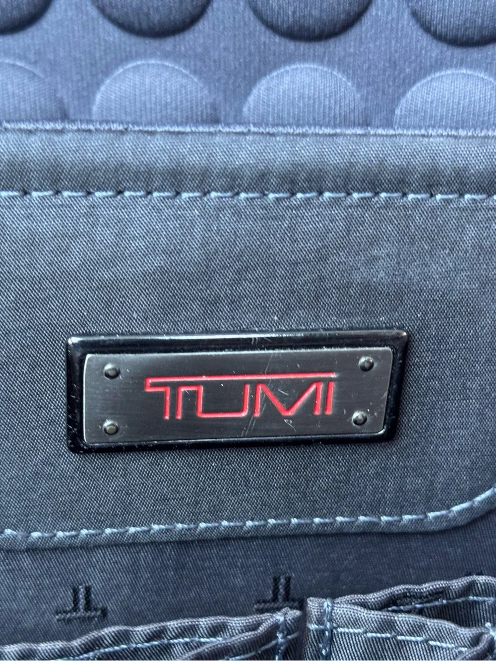 Tumi Black Nylon Travel Backpack with Multiple Compartments